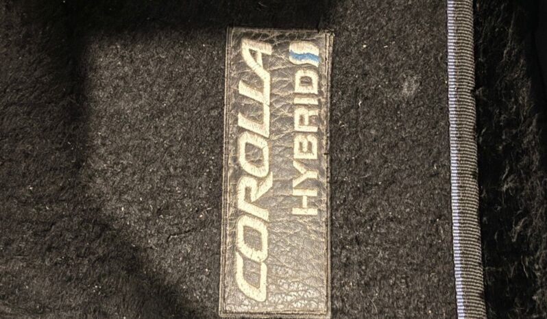 
								COROLLA XEI HV 2024 GRIS CELESTE full									