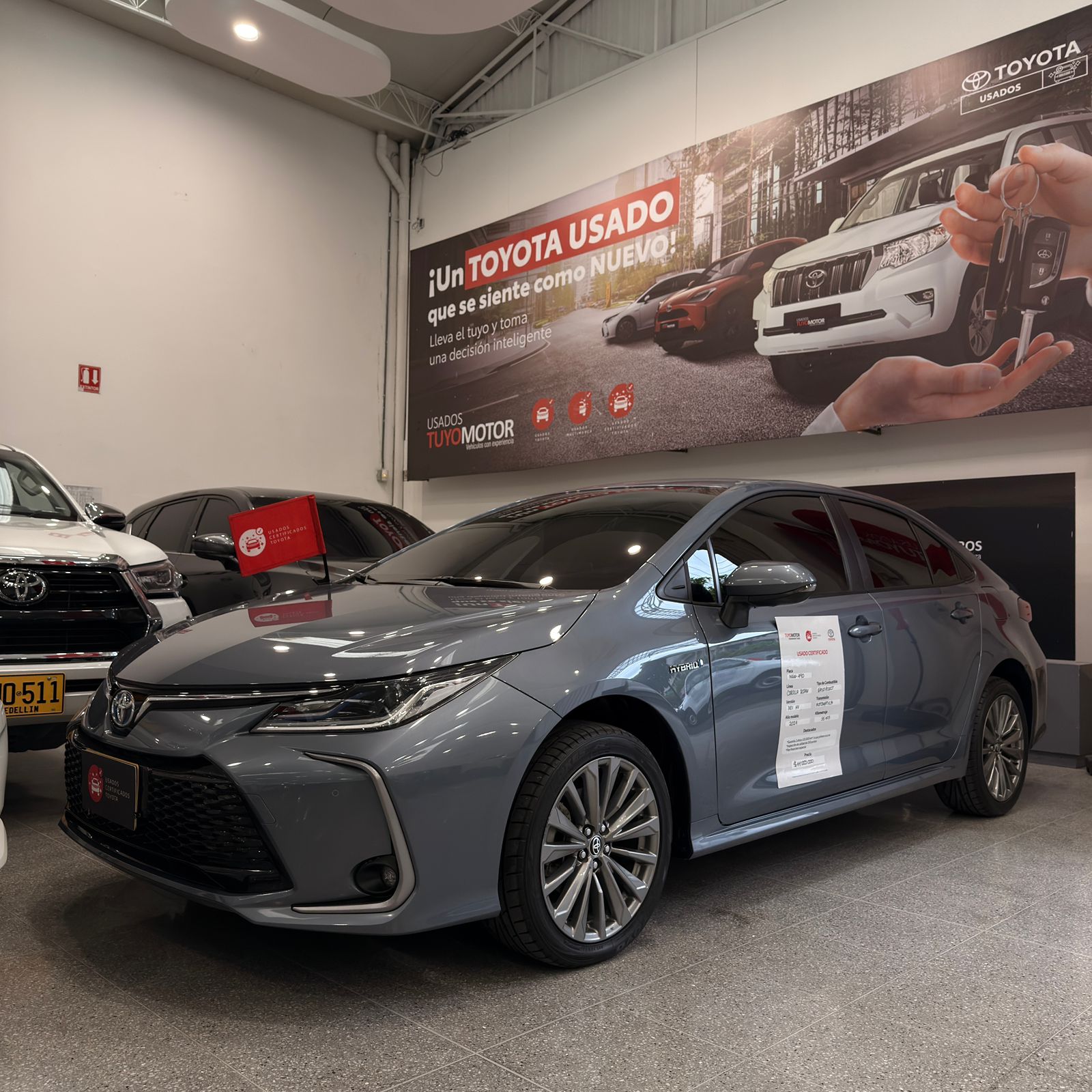 COROLLA XEI HV 2024 GRIS CELESTE