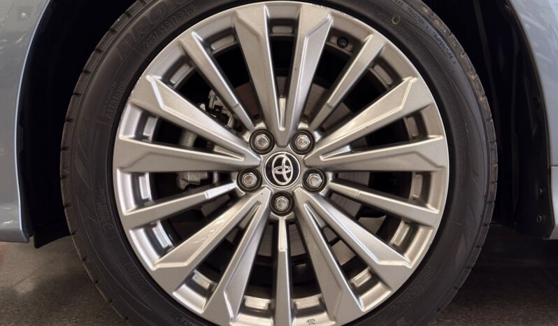 
								COROLLA XEI HV 2024 GRIS CELESTE full									
