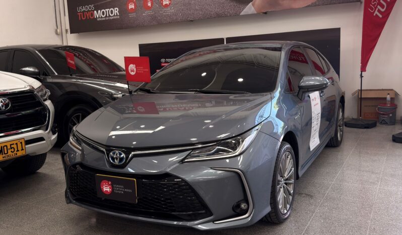 
								COROLLA XEI HV 2024 GRIS CELESTE full									