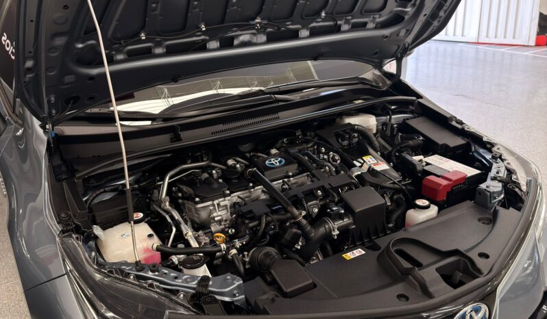 
								COROLLA XEI HV 2024 GRIS CELESTE full									